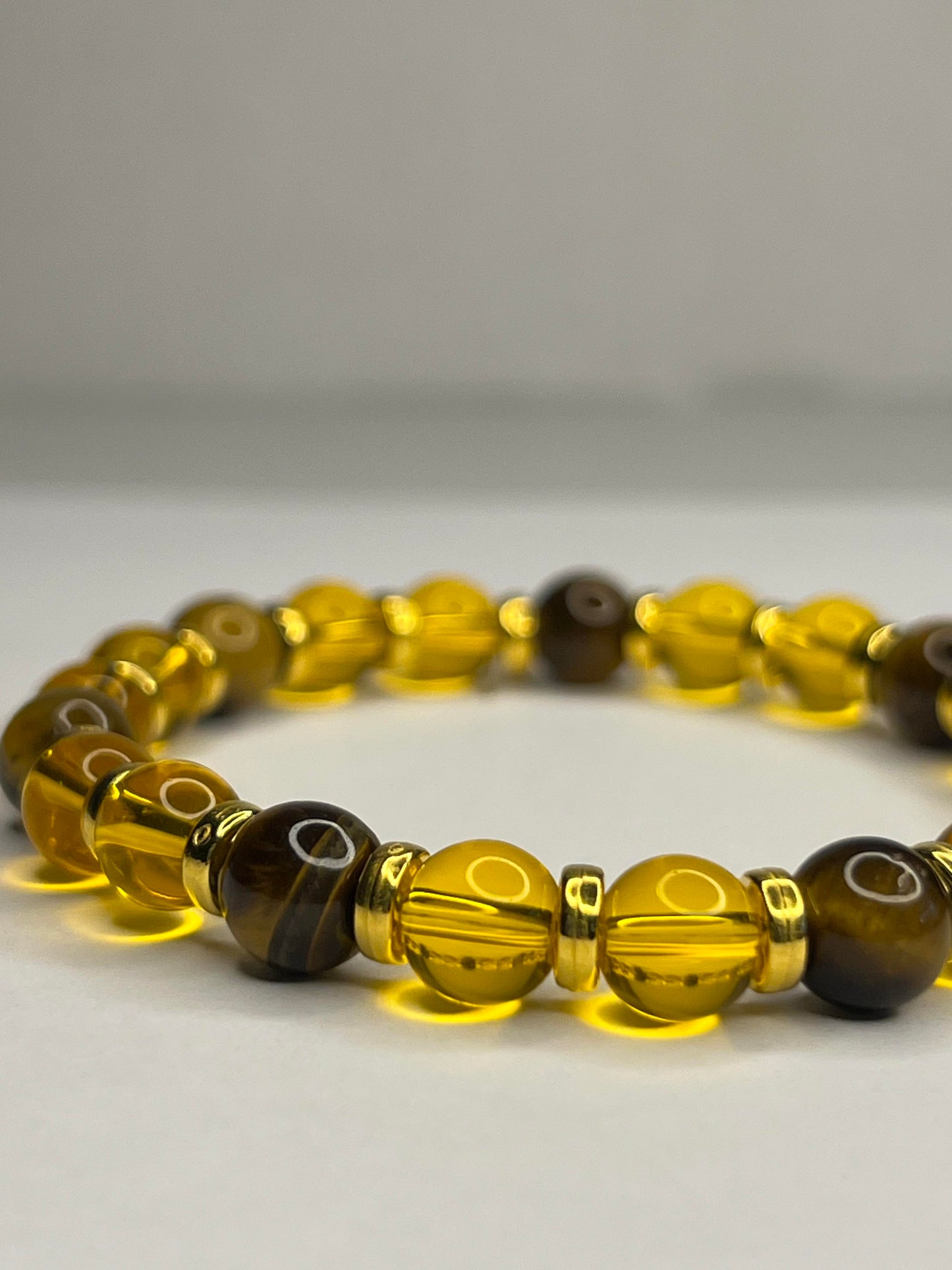 Yellow Tiger eye and yellow Crystal and golden steel