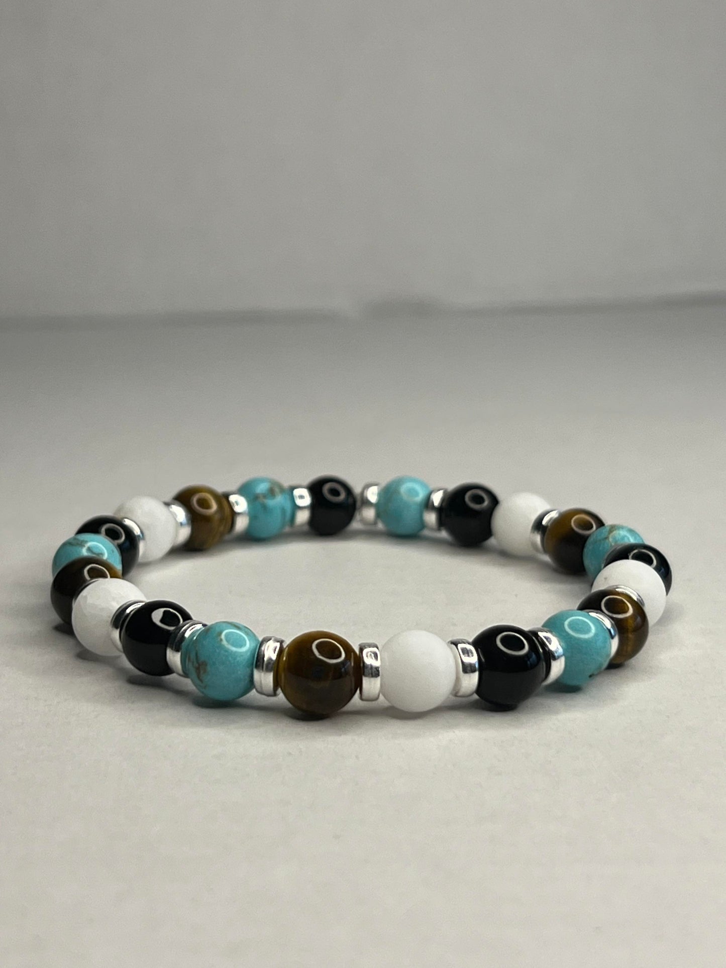 Turquoise and Yellow Tiger Eye with Onyx, Pure White Quartz and steel